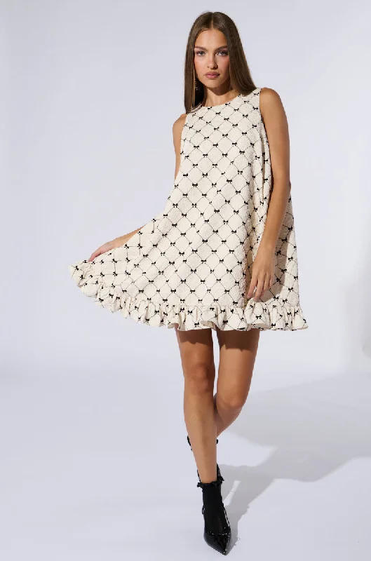 Fashionable, yet affordable women’s apparel   COVERED IN BOWS MINI DRESS