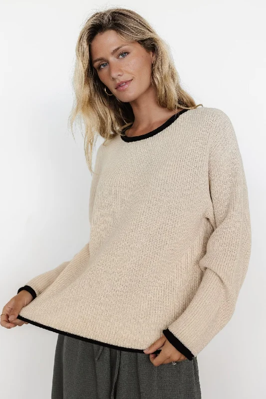 Feminine and fashionable clothing for every wardrobe   Tiffany Knit Sweater | Cream + Black